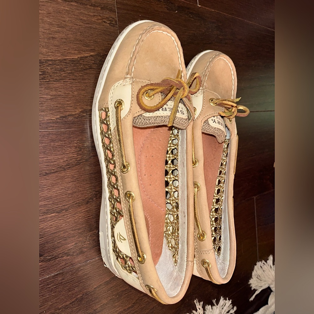 Lightly used Sperrys boat shoes with gold laces and gold accents